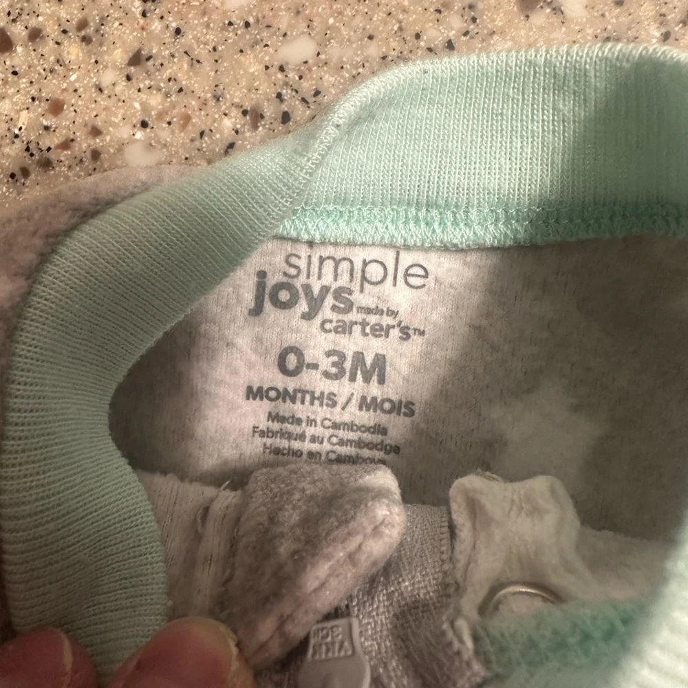 0-3 Month Fuzzy Footed Sleepers.